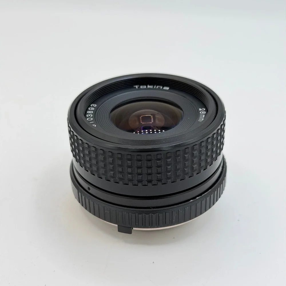 Tokina 28mm f2.8 Wide Angle Prime Lens Minolta MD Mount Japan 49mm UV Filter